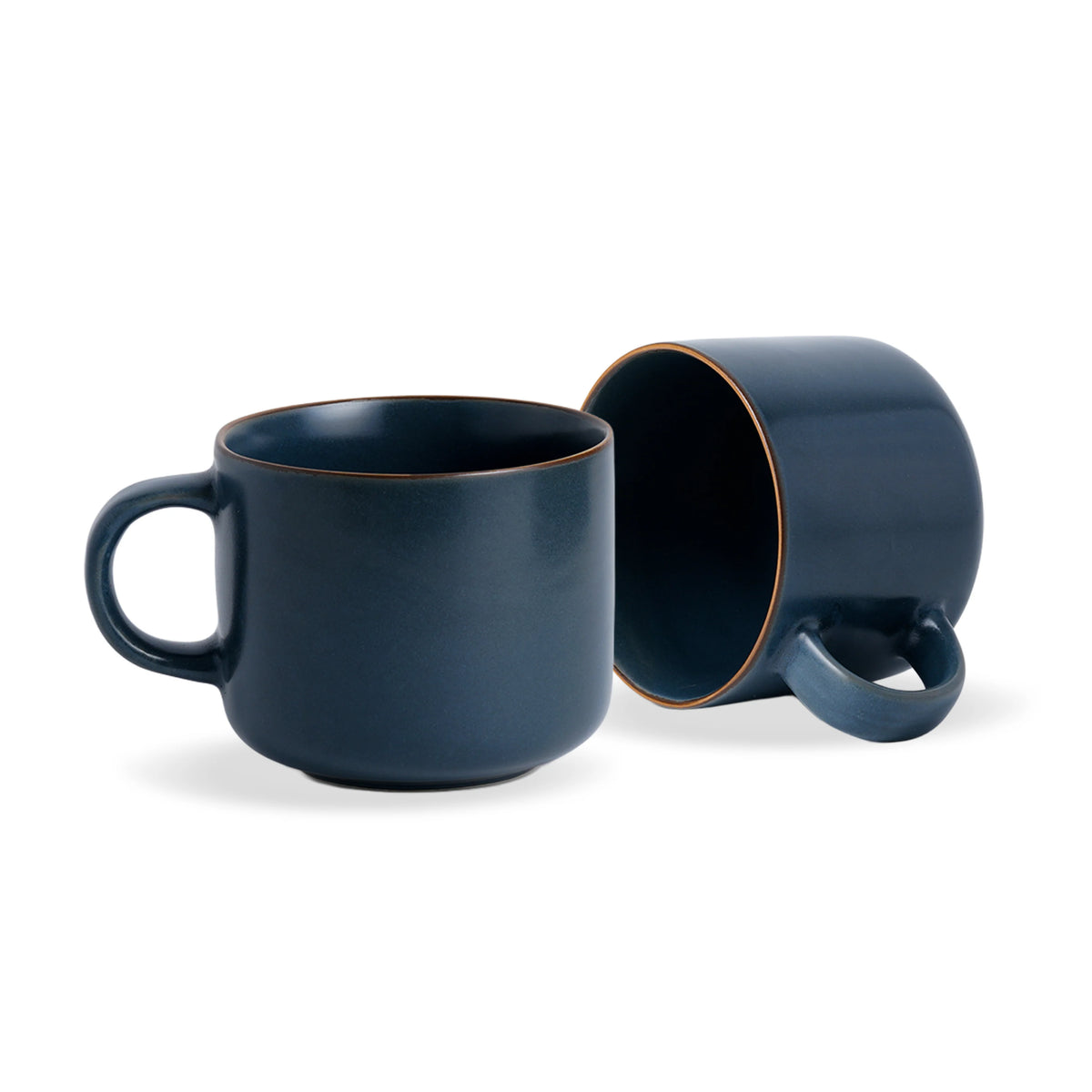Two navy blue mugs on a white background