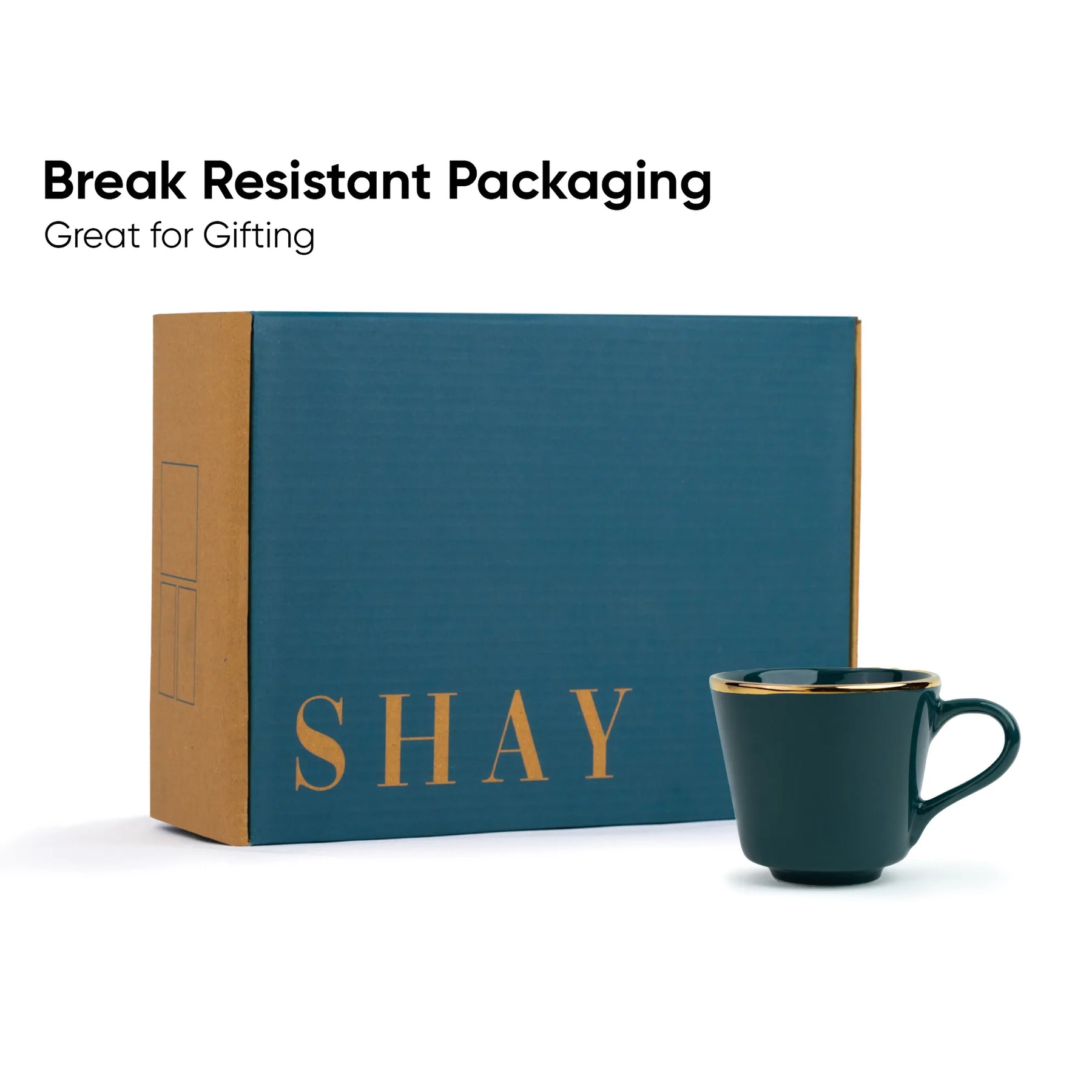 Blue box with 'SHAY' branding and a green mug on a white background, labeled 'Break Resistant Packaging'.