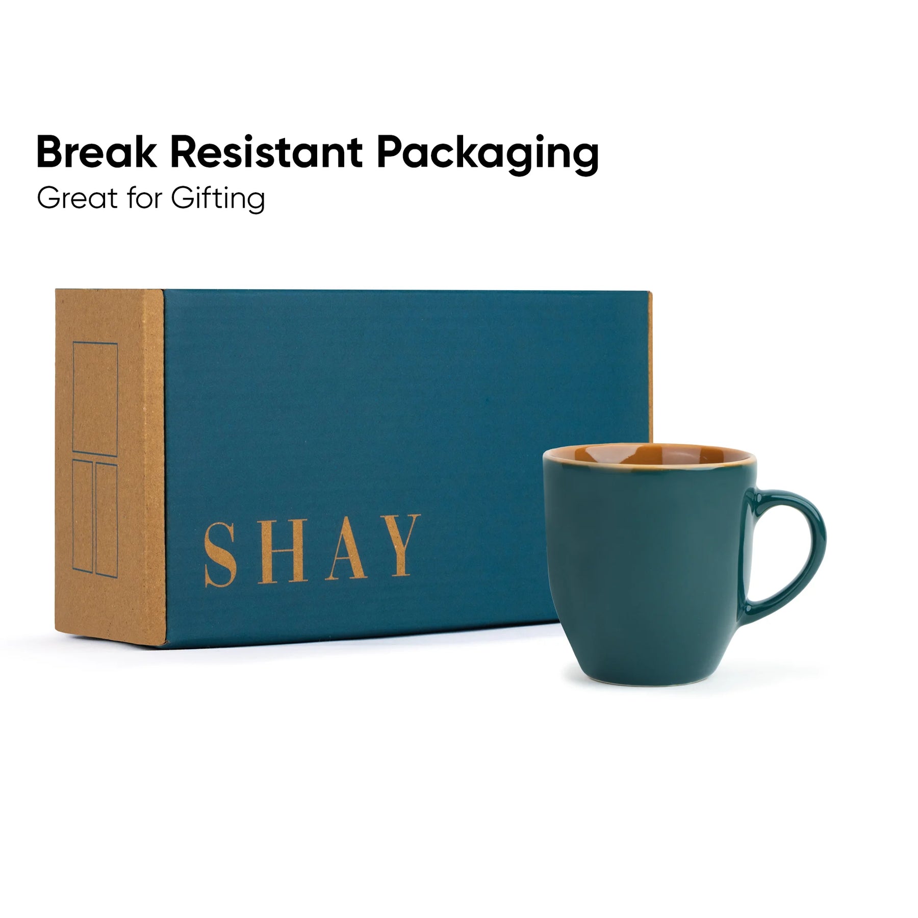Teal mug with 'SHAY' branding next to a box, with text about break-resistant packaging.